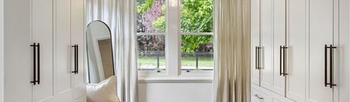 Matte wardrobe doors in a modern bedroom showing contrasting finishes